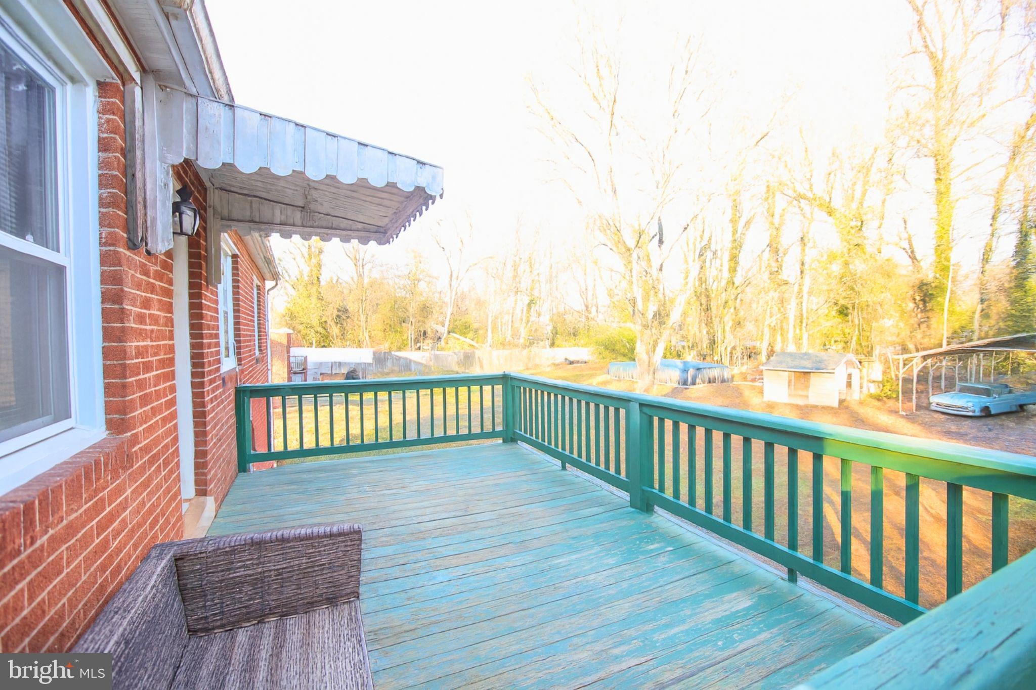 9200 Pine View Lane Clinton, MD 20735 - Photo 24 of 28 a view of a wooden deck