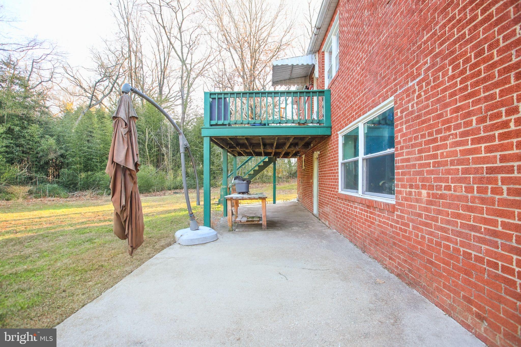 9200 Pine View Lane Clinton, MD 20735 - Photo 25 of 28 a view of a house with backyard and balcony