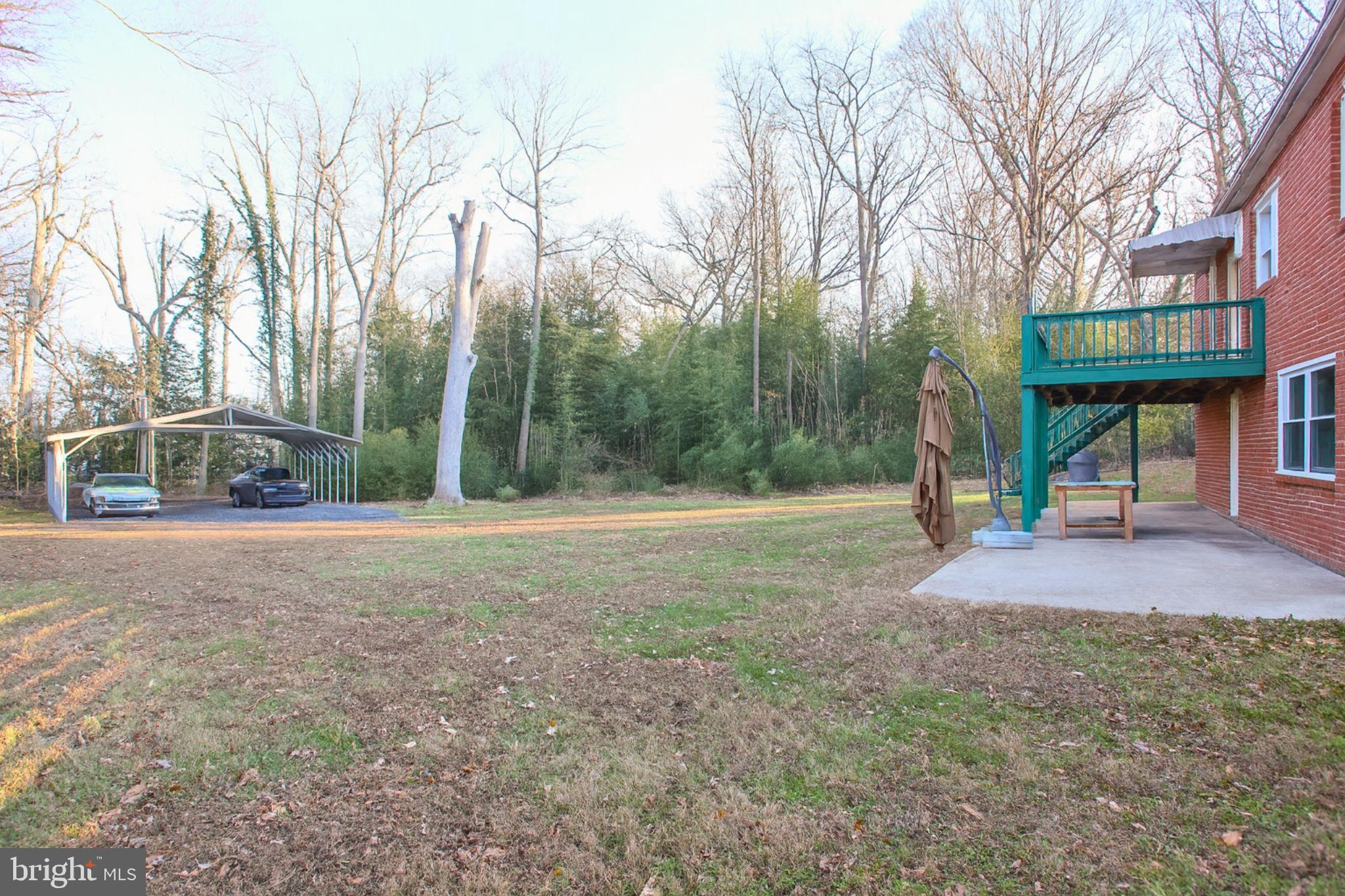 9200 Pine View Lane Clinton, MD 20735 - Photo 26 of 28 a view of a house with backyard and trees