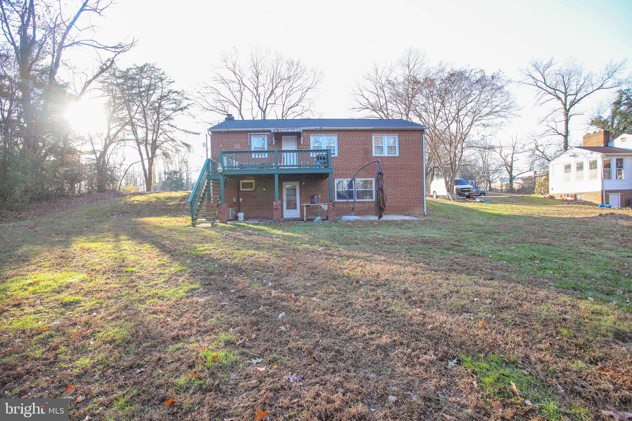 9200 Pine View Lane Clinton, MD 20735 - Photo 28 of 28 a view of a house with a yard and large tree