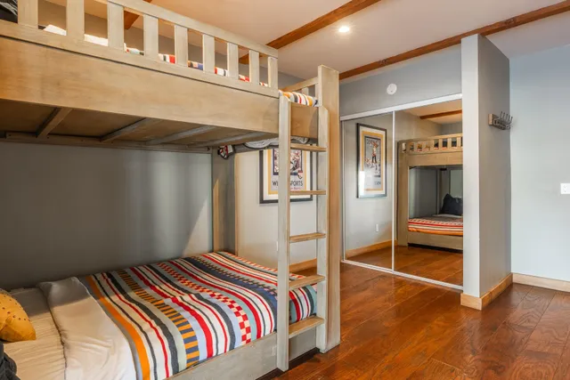 a view of a park with large trees