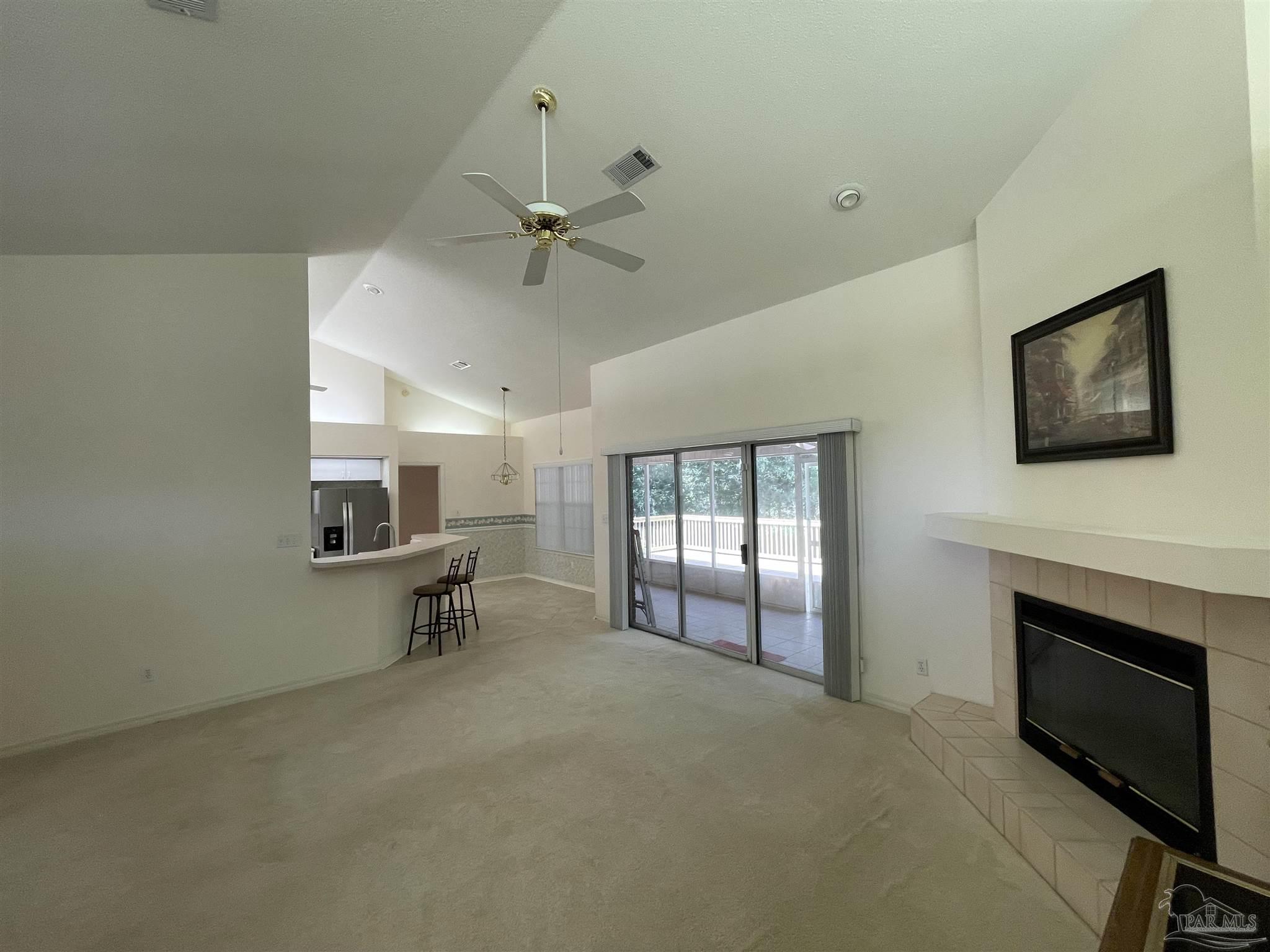 941 Spring Creek Circle Pensacola, FL 32514 - Photo 6 of 30 a view of livingroom with hardwood floor and a ceiling fan