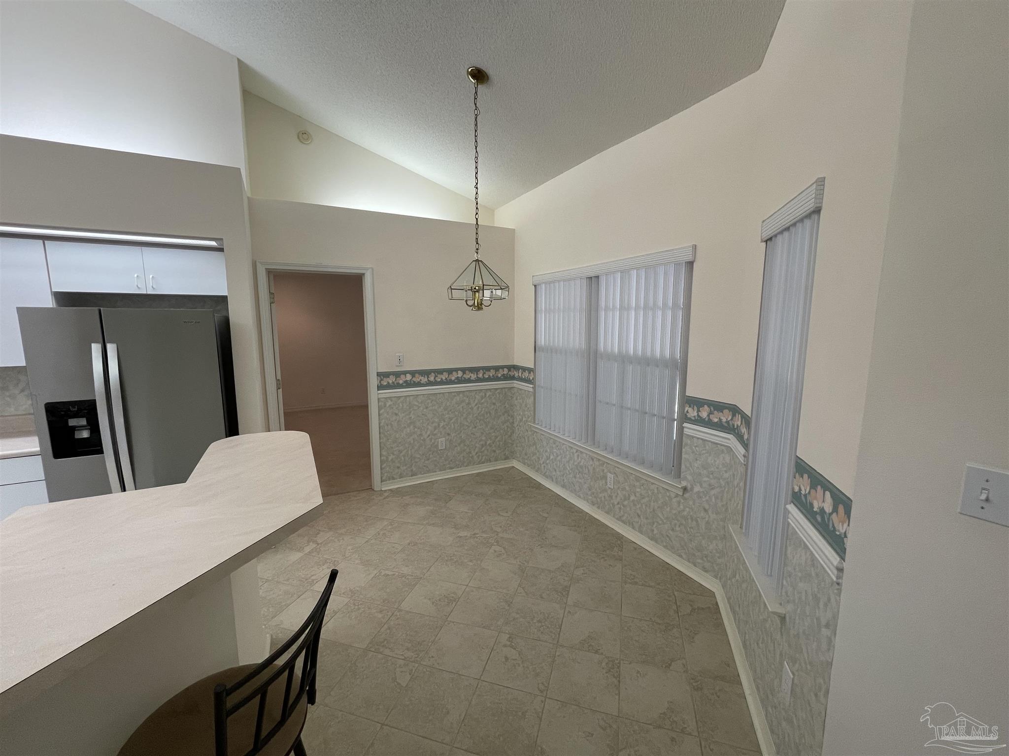 941 Spring Creek Circle Pensacola, FL 32514 - Photo 7 of 30 a view of kitchen and refrigerator