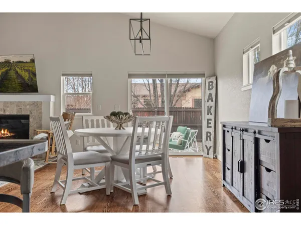 a view of a livingroom with furniture window and wooden floor
