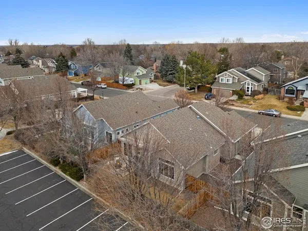 an aerial view of a house with a outdoor space