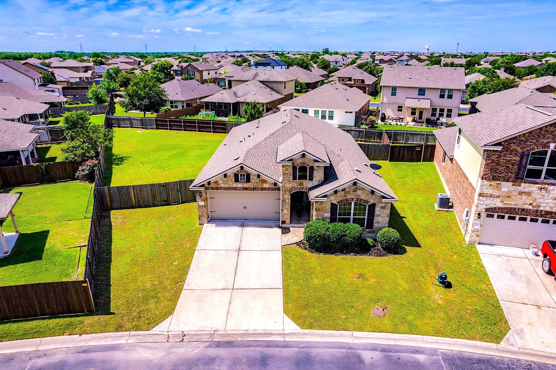 16829 Ruggio Road Pflugerville, TX 78660 - Photo 32 of 40 an aerial view of a house with a swimming pool
