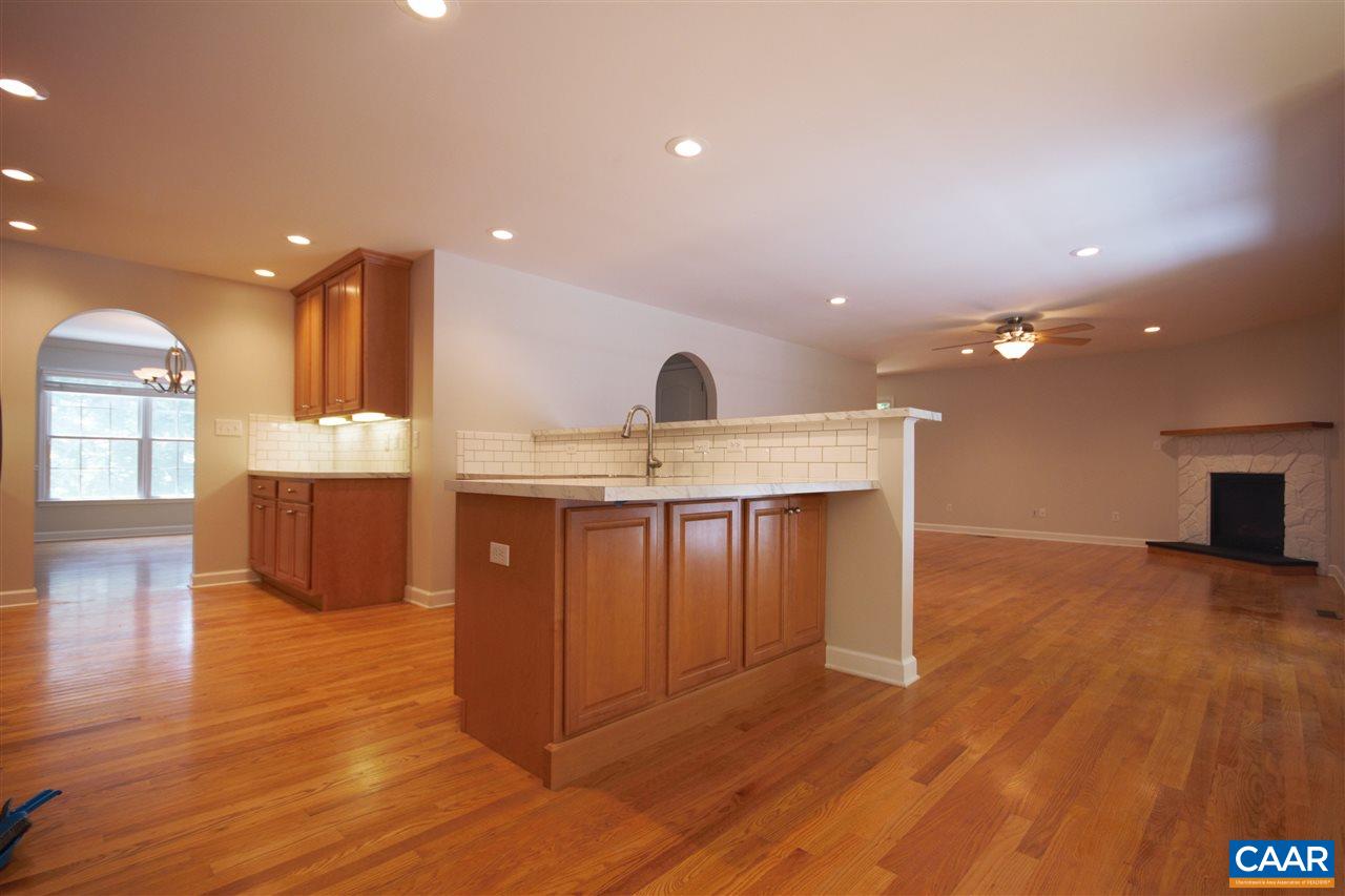 28 Zephyr Road Palmyra, VA 22963 - Photo 3 of 20 a view of a kitchen with kitchen island a sink stainless steel appliances and cabinets