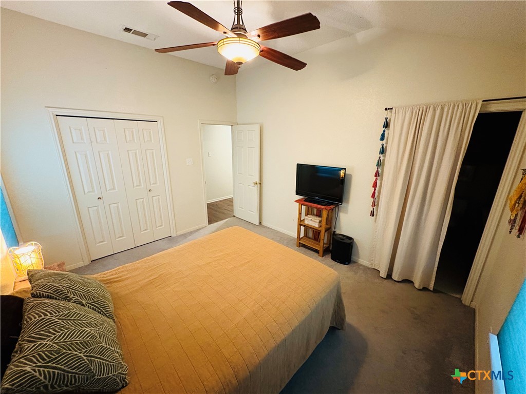 369 County Road 3367 Kempner, TX 76539 - Photo 9 of 18 a bedroom with a bed and a flat screen tv