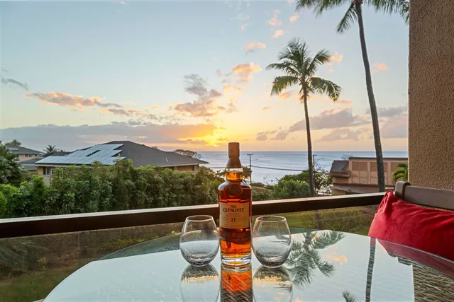 a view of a balcony with lake view and mountain view