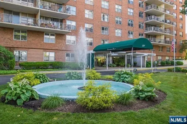 a view of a building with garden