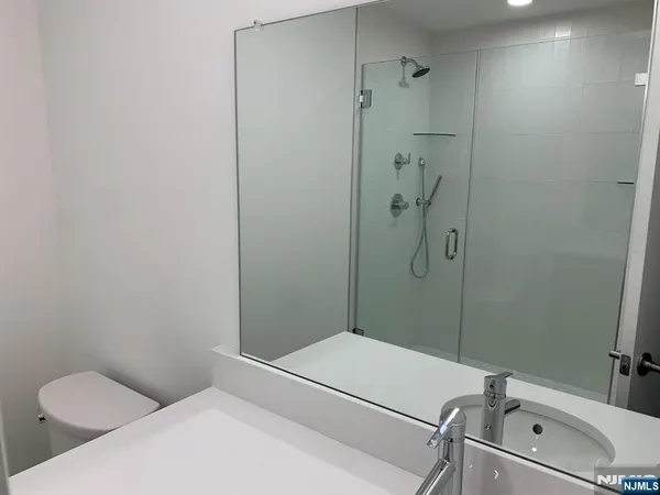 a bathroom with a sink and toilet