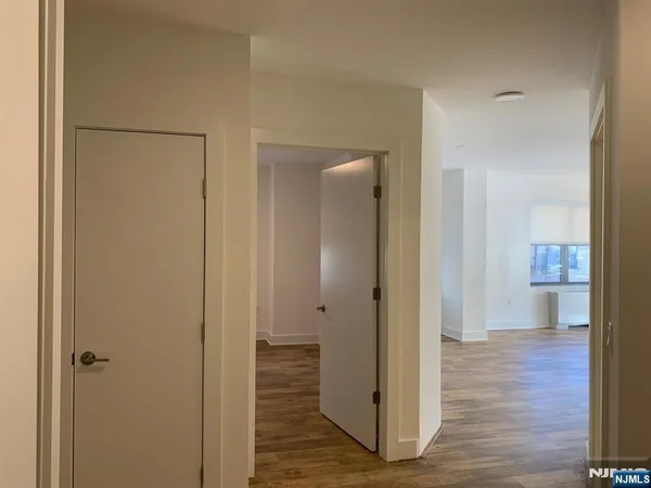 a view of a bathroom with wooden floor