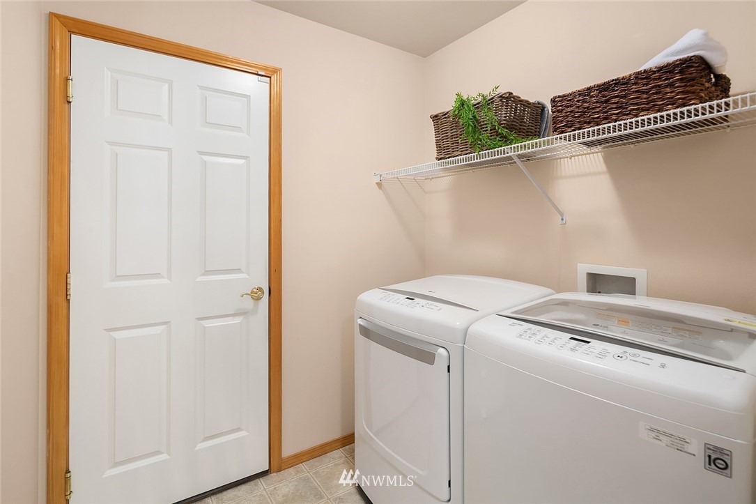 24204 18th Place West Bothell, WA 98021 - Photo 18 of 28 a utility room with dryer and washer
