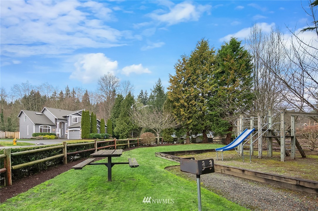 24204 18th Place West Bothell, WA 98021 - Photo 28 of 28 a view of a park with slide