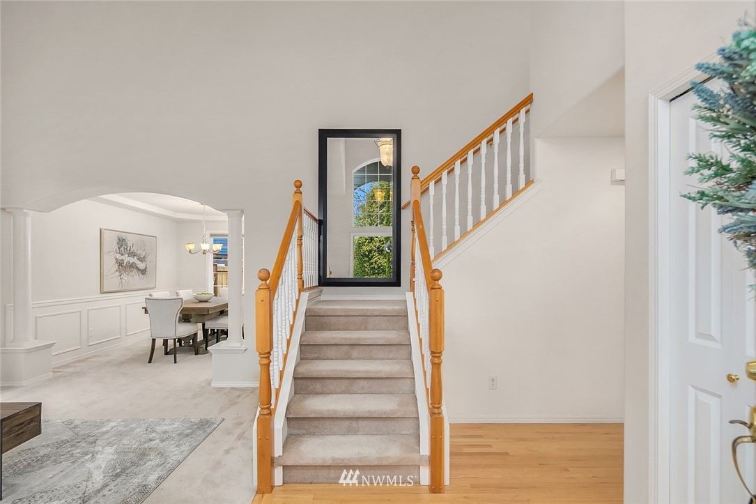 24204 18th Place West Bothell, WA 98021 - Photo 3 of 28 a view of entryway and hall with wooden floor