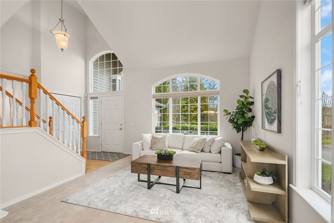 24204 18th Place West Bothell, WA 98021 - Photo 6 of 28 a living room with furniture and a large window