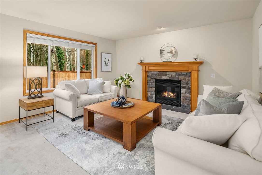 24204 18th Place West Bothell, WA 98021 - Photo 9 of 28 a living room with furniture and a fireplace