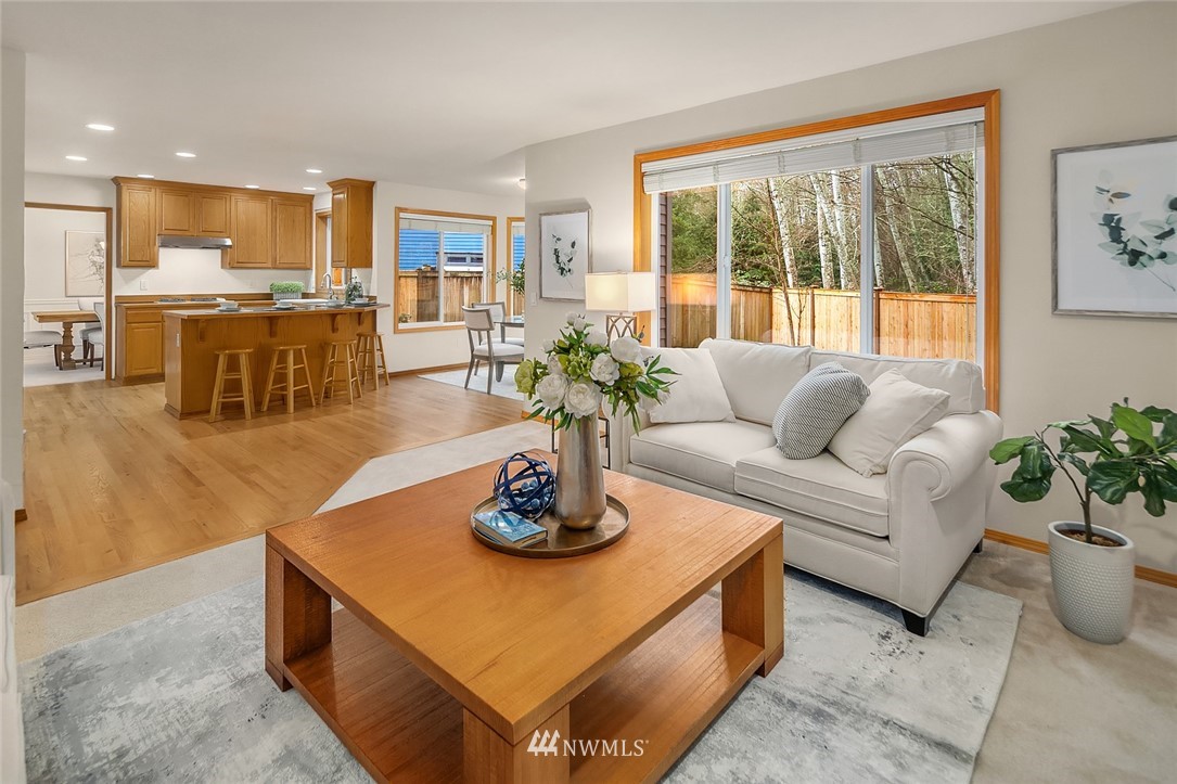 24204 18th Place West Bothell, WA 98021 - Photo 10 of 28 a living room with furniture kitchen and a large window