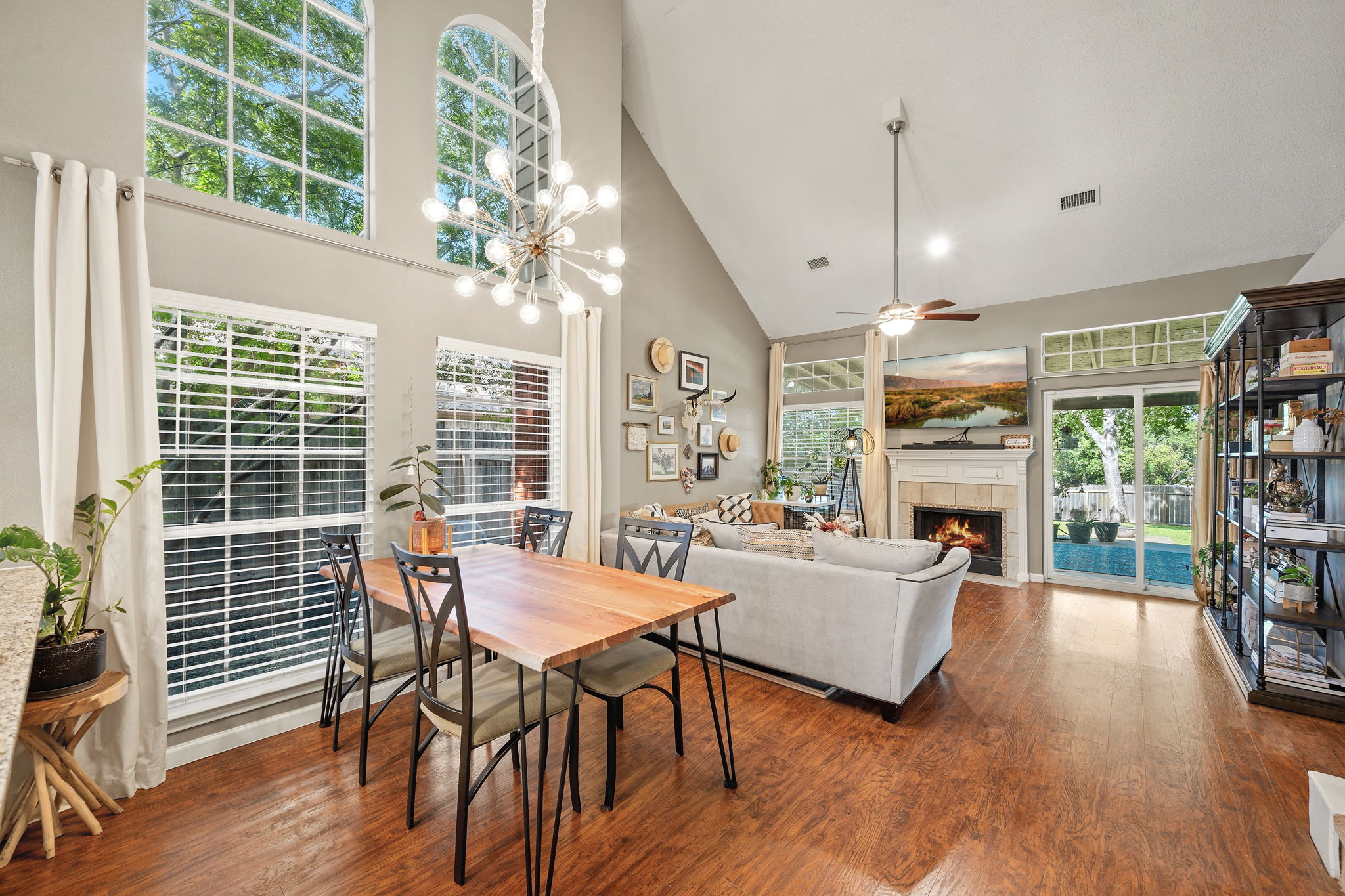 705 Canyon Bend Road Pflugerville, TX 78660 - Photo 7 of 23 a view of a dining room with furniture window and wooden floor