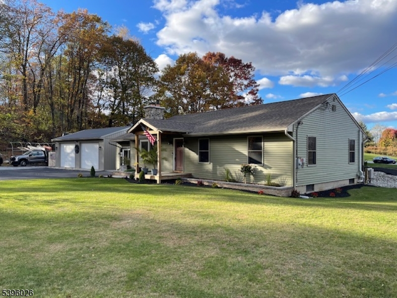 4435 Rudetown Road Hamburg, NJ 07419 - Photo 5 of 24 a view of a house with a yard and sitting area