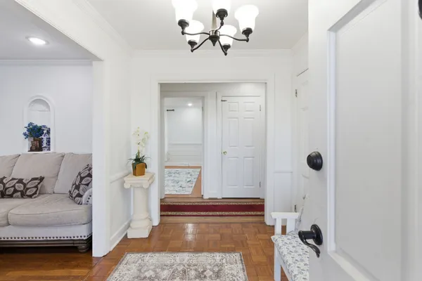 a living room with furniture and a rug