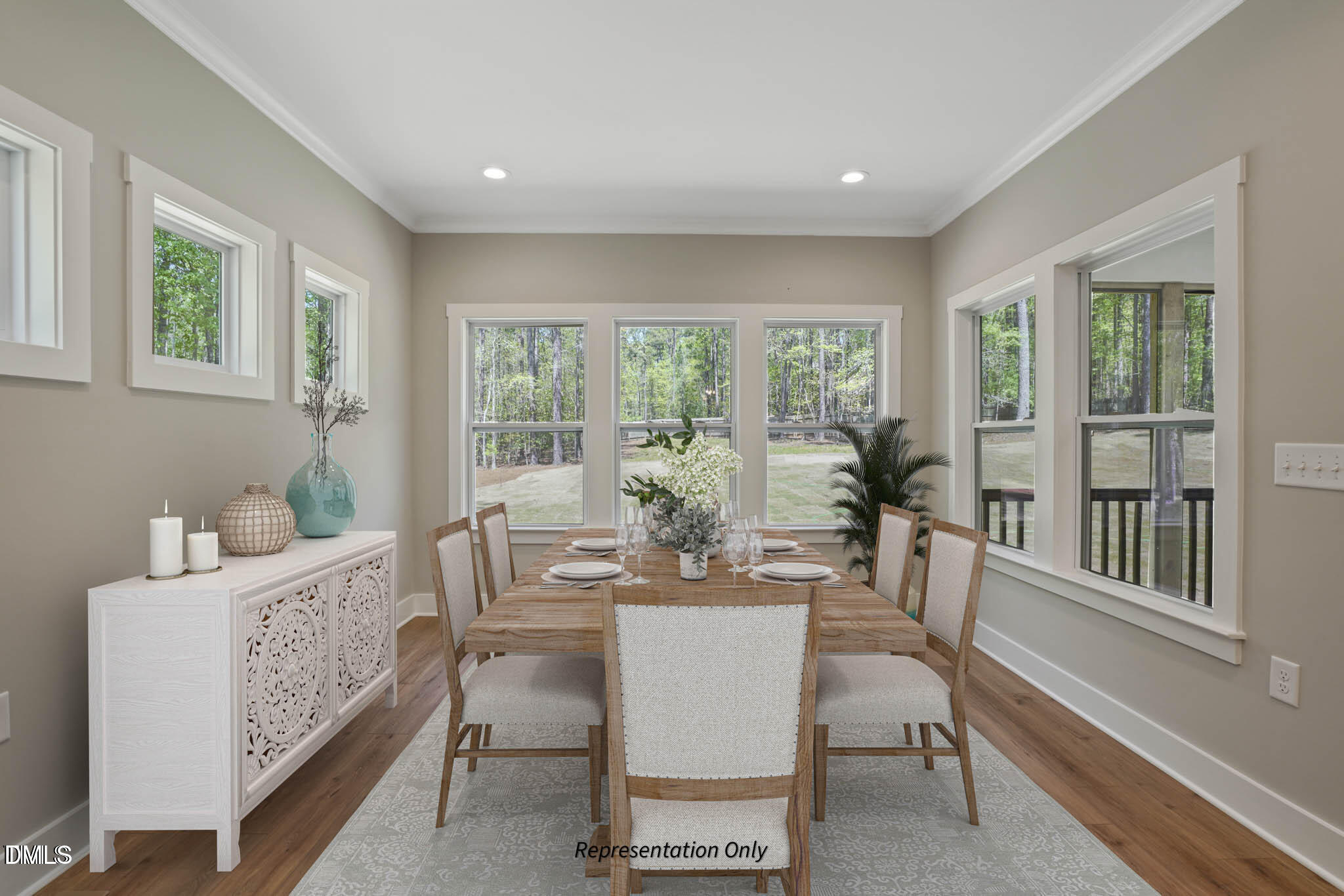 110 Merle Way Zebulon, NC 27597 - Photo 2 of 3 a dining room with furniture and a large window