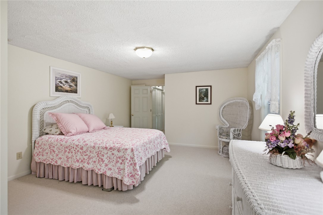 6 Tradewinds Way Salem, SC 29676 - Photo 24 of 50 This cozy bedroom features plush carpeting and a bright window, offering a serene and inviting atmosphere.