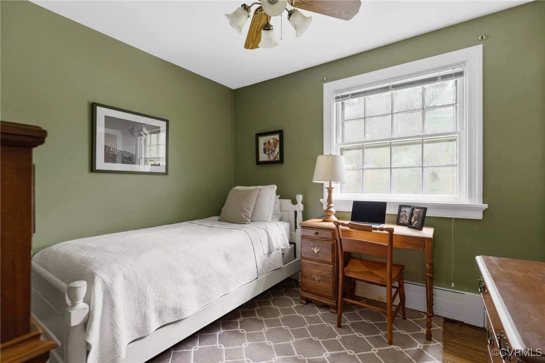 4233 Waumsetta Road Richmond, VA 23235 - Photo 12 of 32 a bedroom with a bed and a window