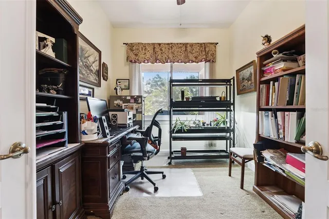 a spacious bathroom with a bathtub sink and mirror