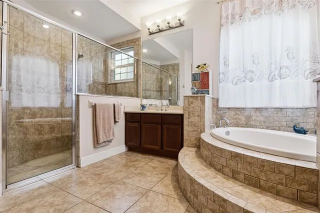 a bedroom with a bed and a book shelf