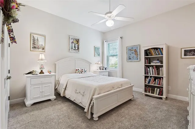 a bathroom with a sink toilet a mirror and shower