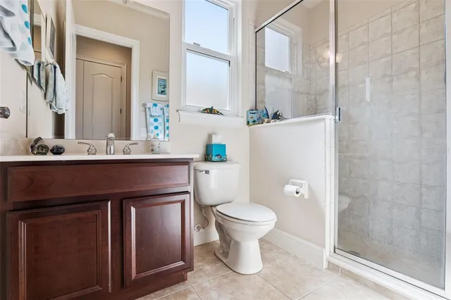 a living room with furniture and a gate