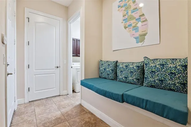 a view of a dining room with furniture window and outside view