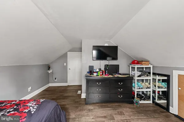 a front view of a house with a yard patio and swimming pool