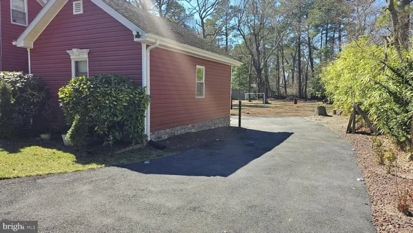 a view of a swimming pool with a lounge chairs
