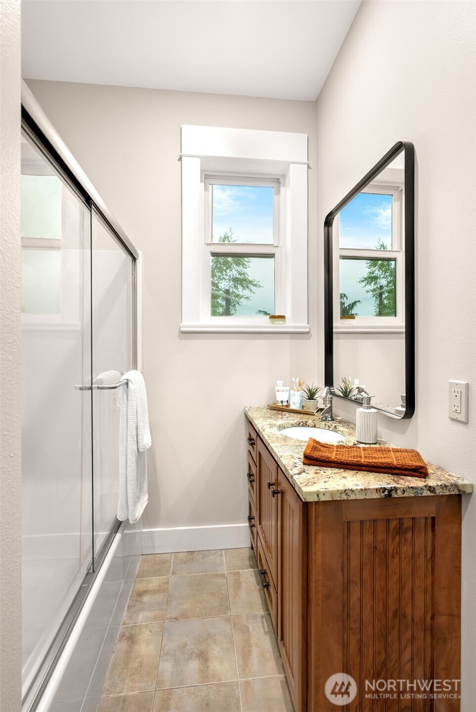 2304 Norman Road Stanwood, WA 98292 - Photo 10 of 39 a bathroom with a granite countertop sink and a mirror