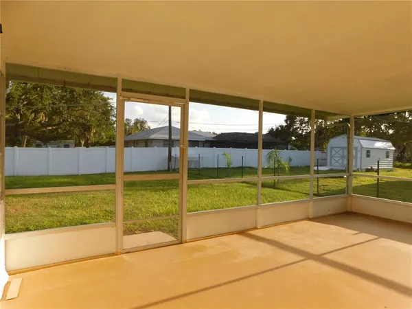 a view of an empty room with a bathtub