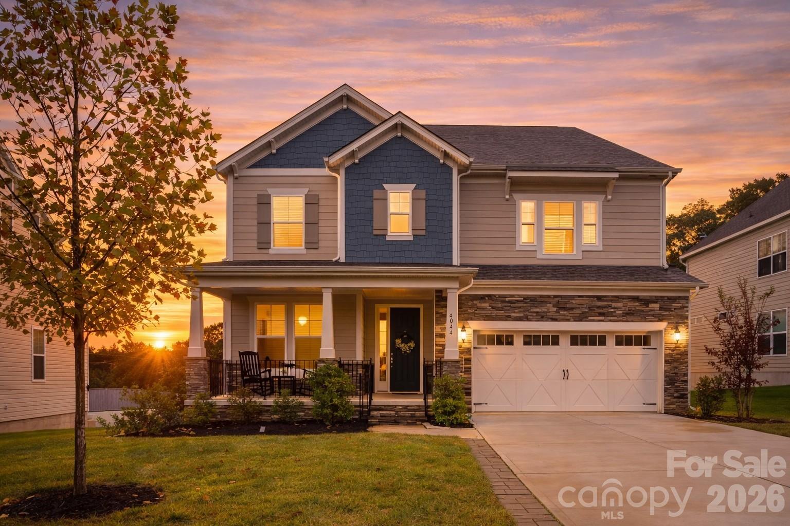 front view of a house with a yard