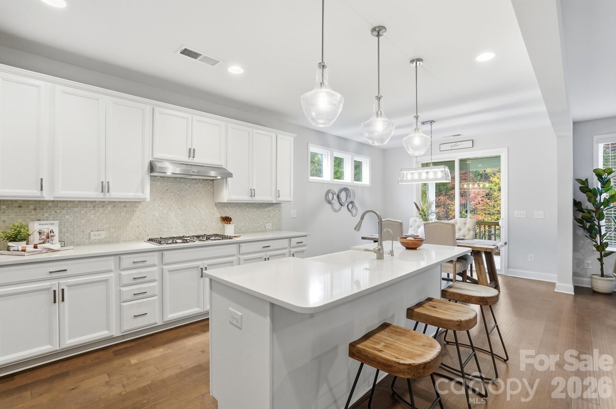 4044 Brandywine Terrace Lancaster, SC 29720 - Photo 14 of 48 a large white kitchen with a large window