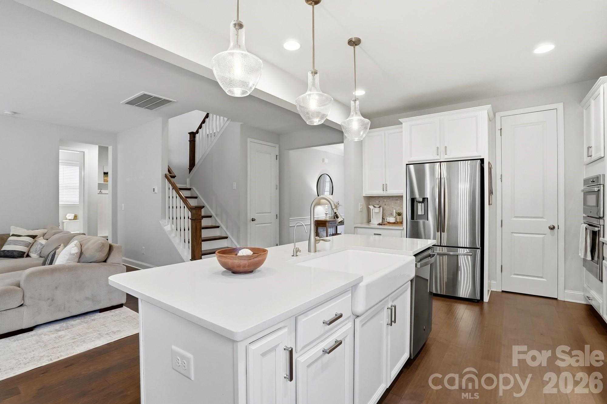4044 Brandywine Terrace Lancaster, SC 29720 - Photo 17 of 48 a kitchen with stainless steel appliances granite countertop a sink a refrigerator and a stove