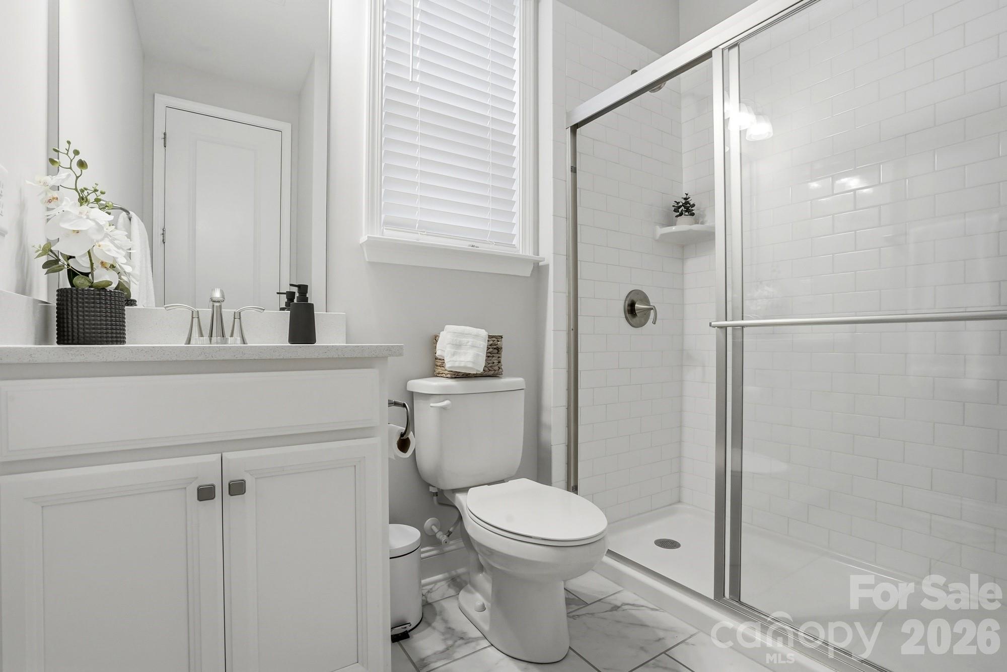 4044 Brandywine Terrace Lancaster, SC 29720 - Photo 29 of 48 a bathroom with a sink a toilet and shower