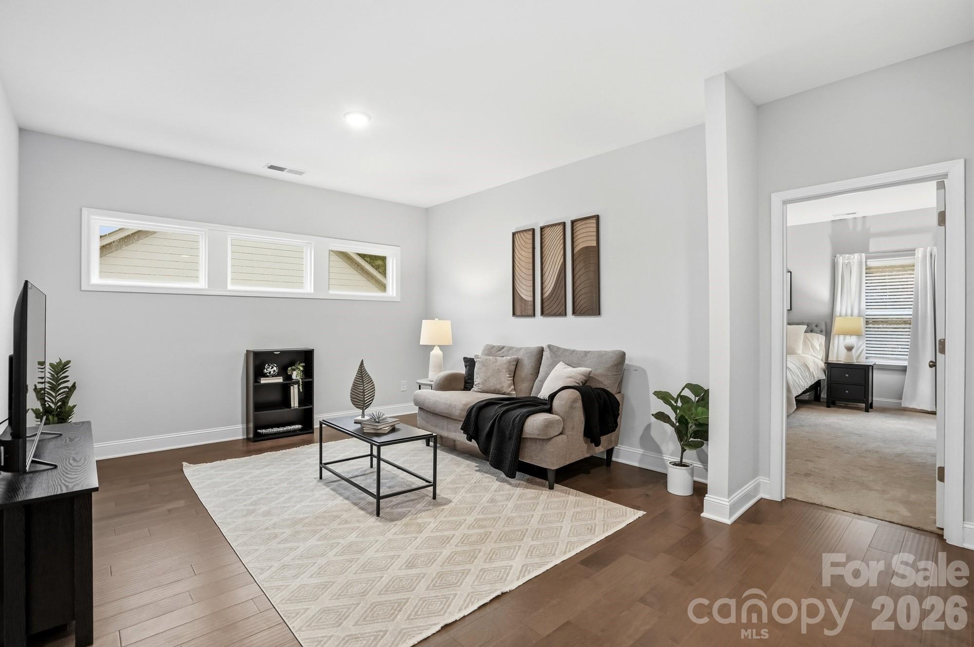 4044 Brandywine Terrace Lancaster, SC 29720 - Photo 30 of 48 a living room with furniture and a fireplace