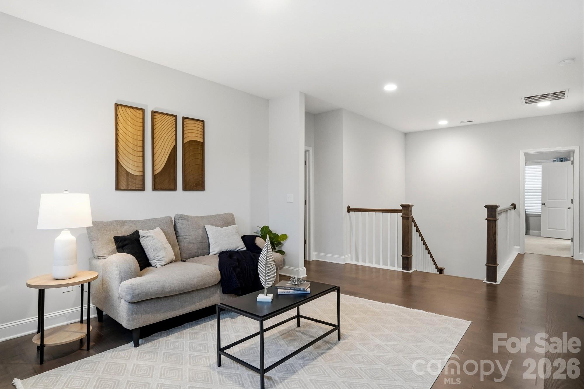 4044 Brandywine Terrace Lancaster, SC 29720 - Photo 32 of 48 a living room with furniture and a wooden floor