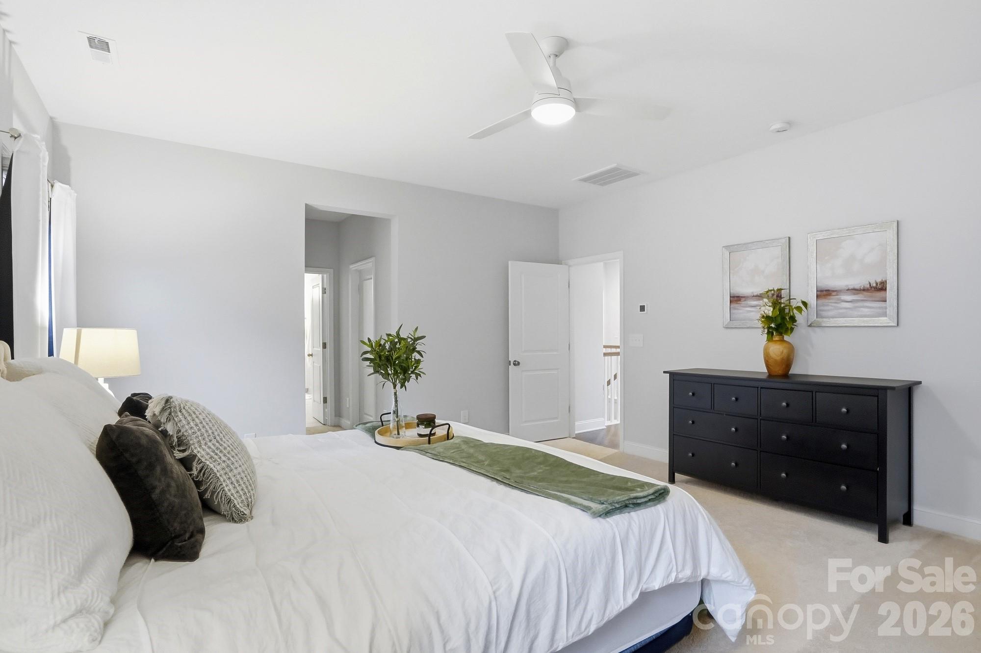 4044 Brandywine Terrace Lancaster, SC 29720 - Photo 34 of 48 a bedroom with a bed and a dresser