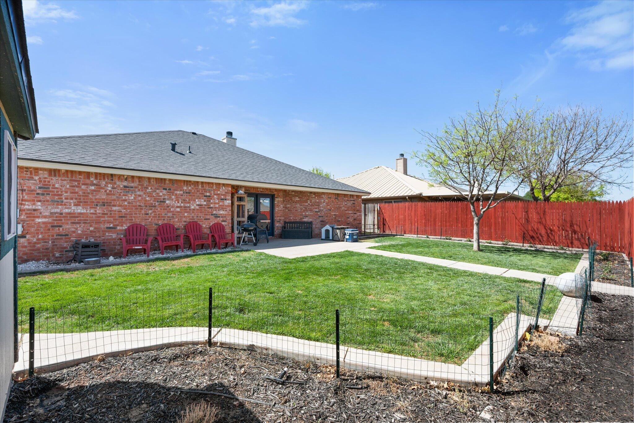 5704 107th Street Lubbock, TX 79424 - Photo 34 of 36 a view of backyard with green space