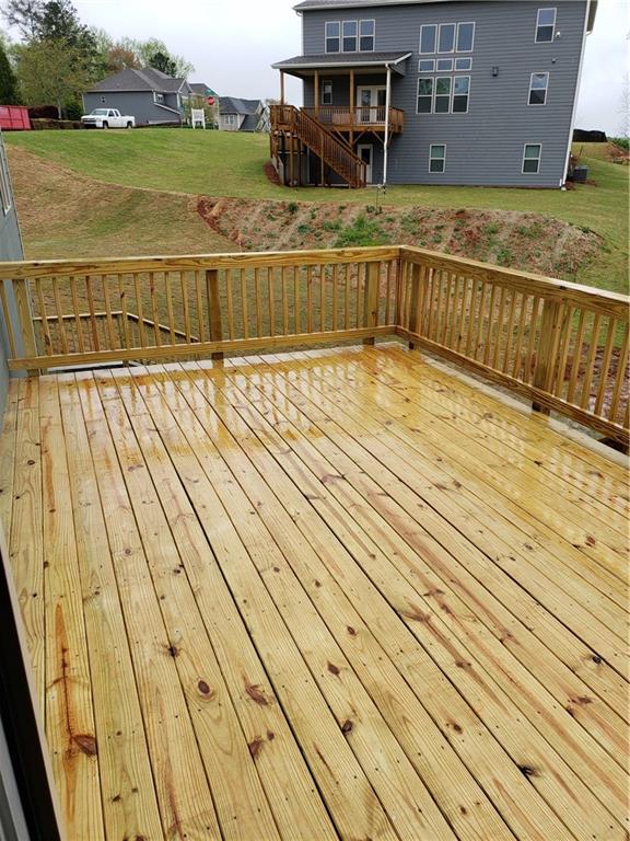 4735 Watkins Way Cumming, GA 30040 - Photo 11 of 31 a view of balcony with wooden floor