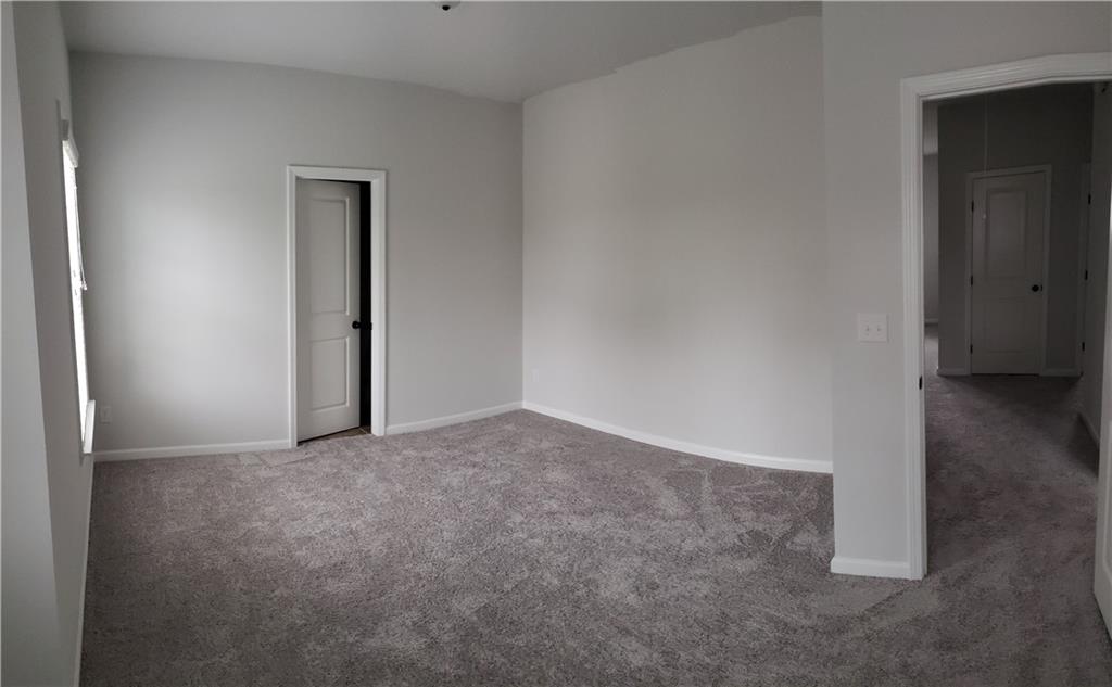 4735 Watkins Way Cumming, GA 30040 - Photo 21 of 31 a view of an empty room and closet