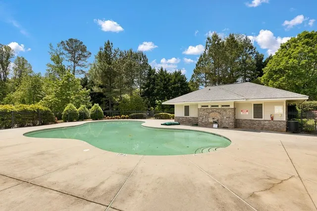 a view of a chairs and table in a patio