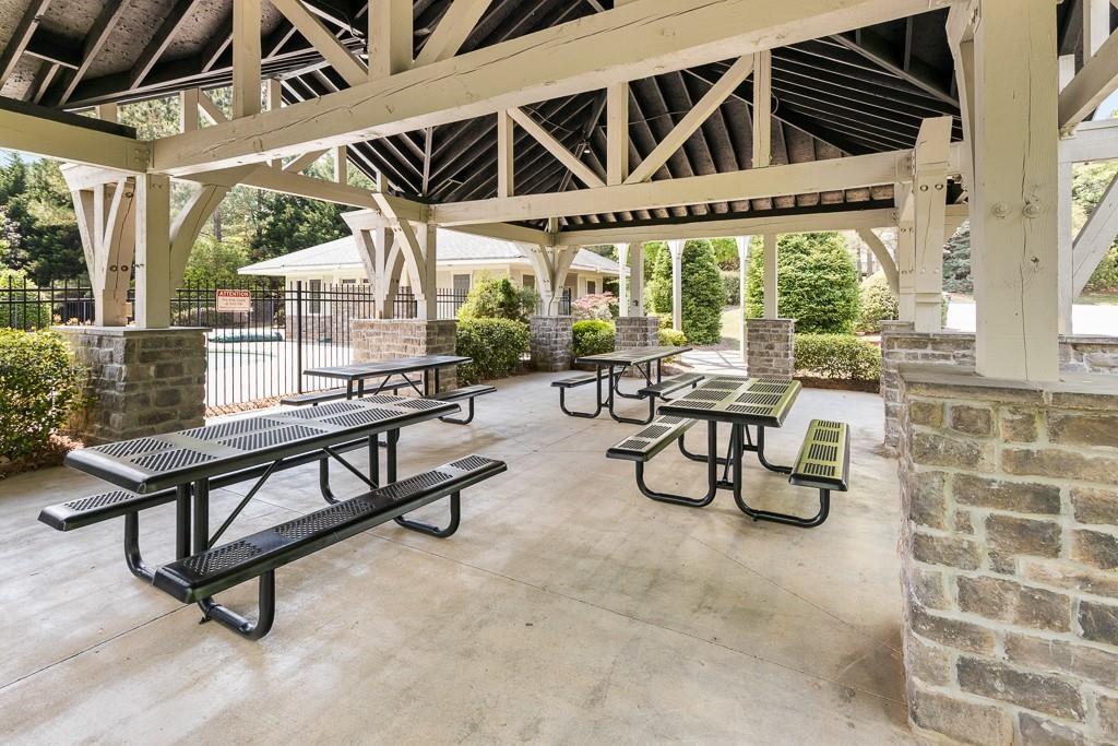 4735 Watkins Way Cumming, GA 30040 - Photo 28 of 31 a view of a chairs and table in a patio