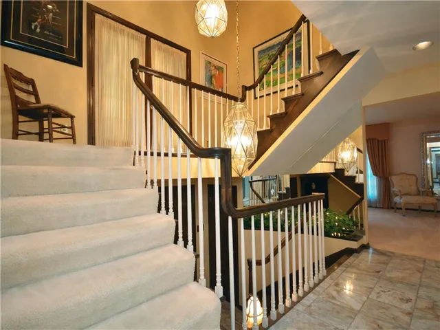 a view of a hallway with windows